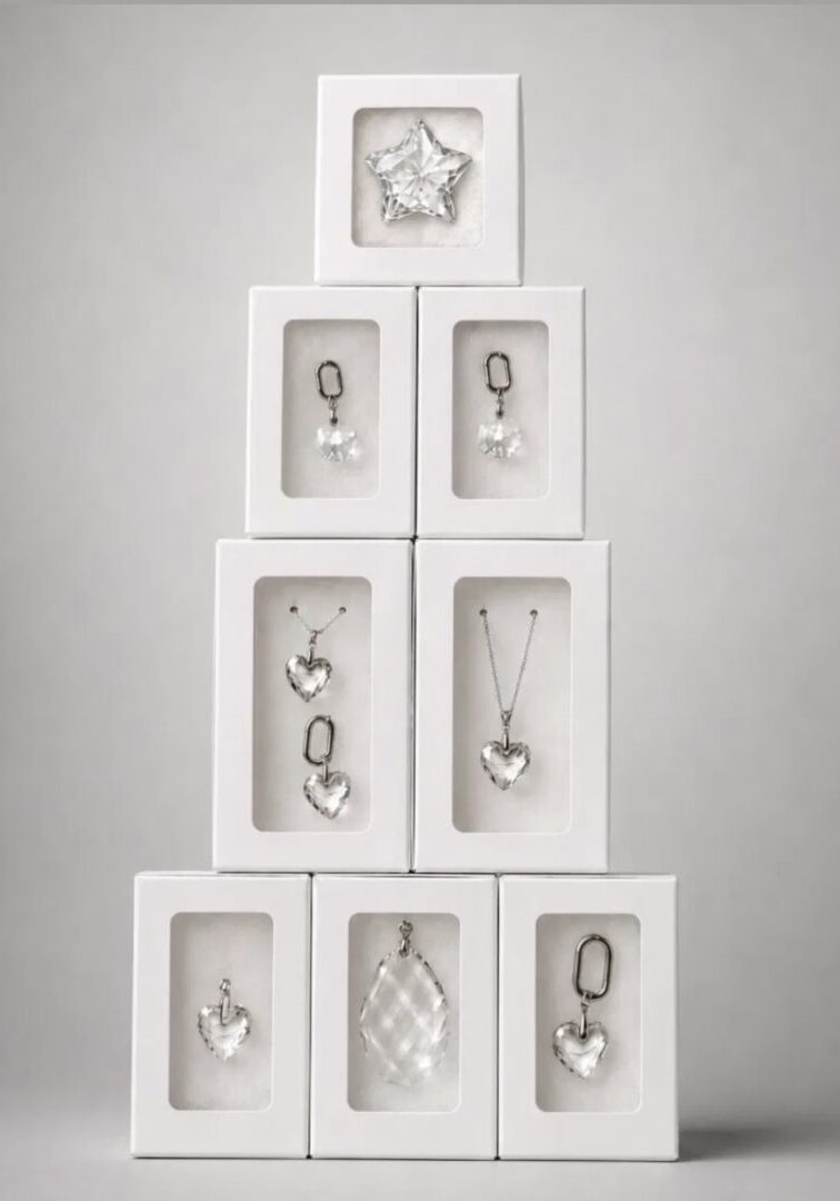 Stacked white boxes with crystal pendants